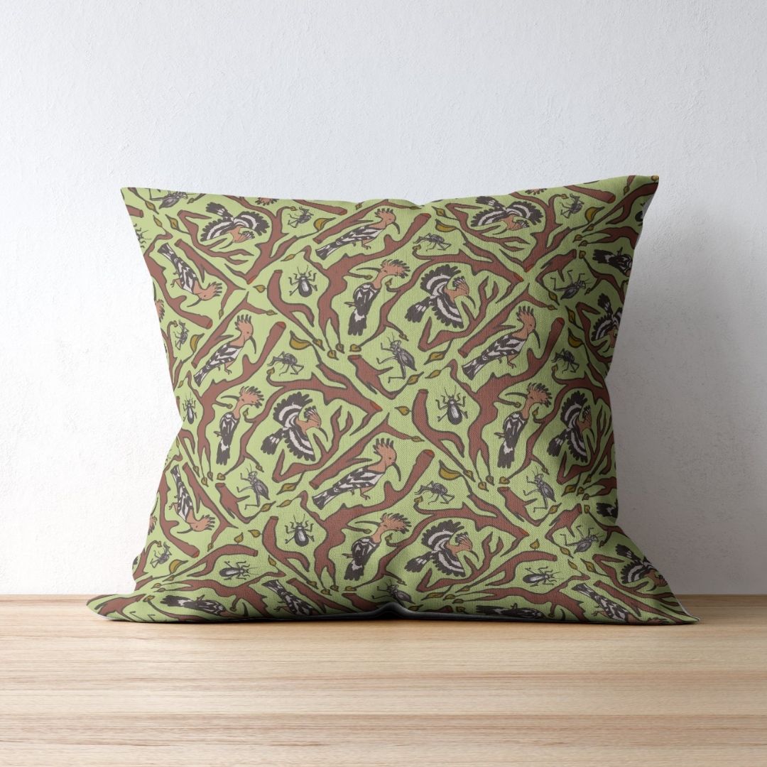 Bird and Branch pattern in sage on a square cushion