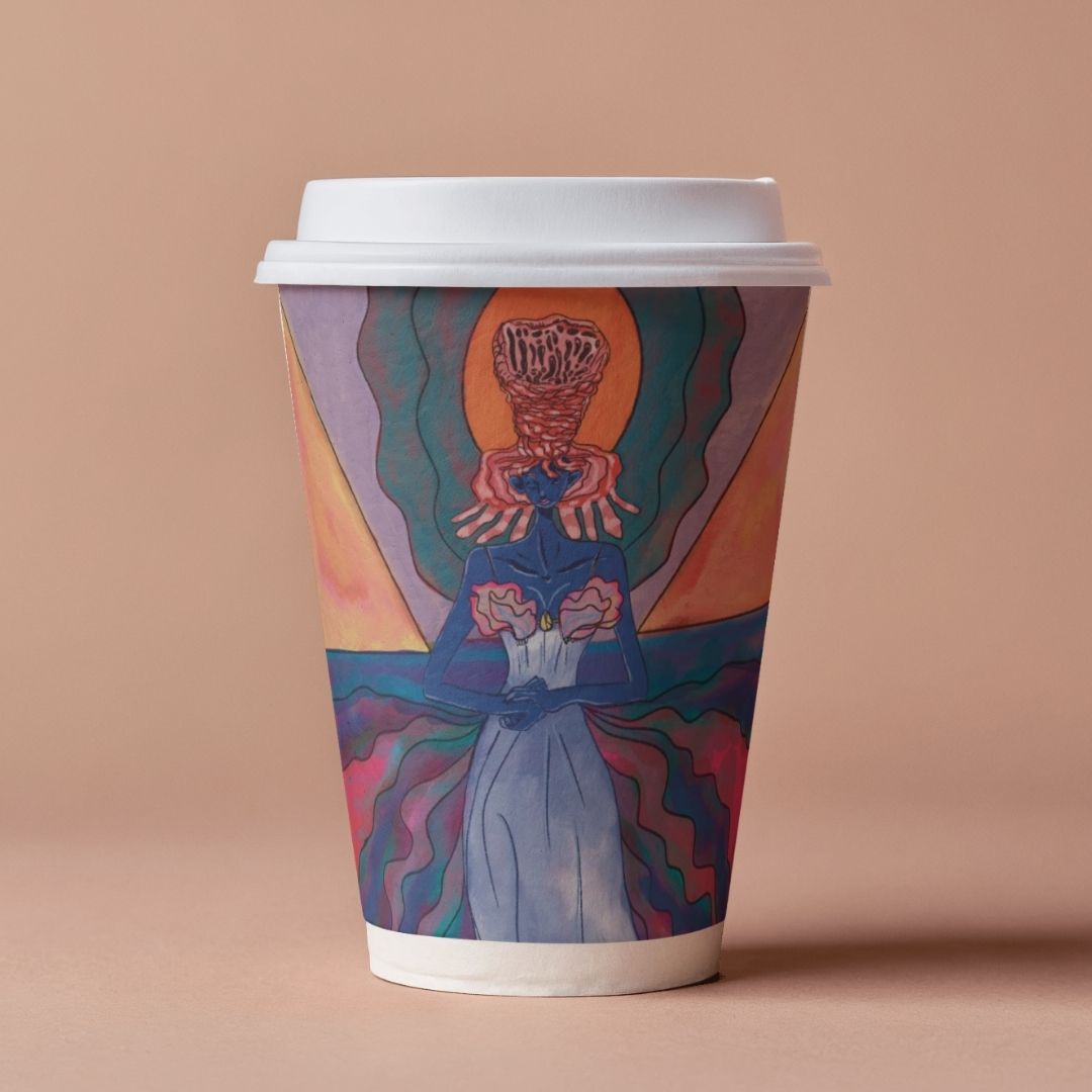 Coral Seraph artwork wrapped around a paper coffee cup