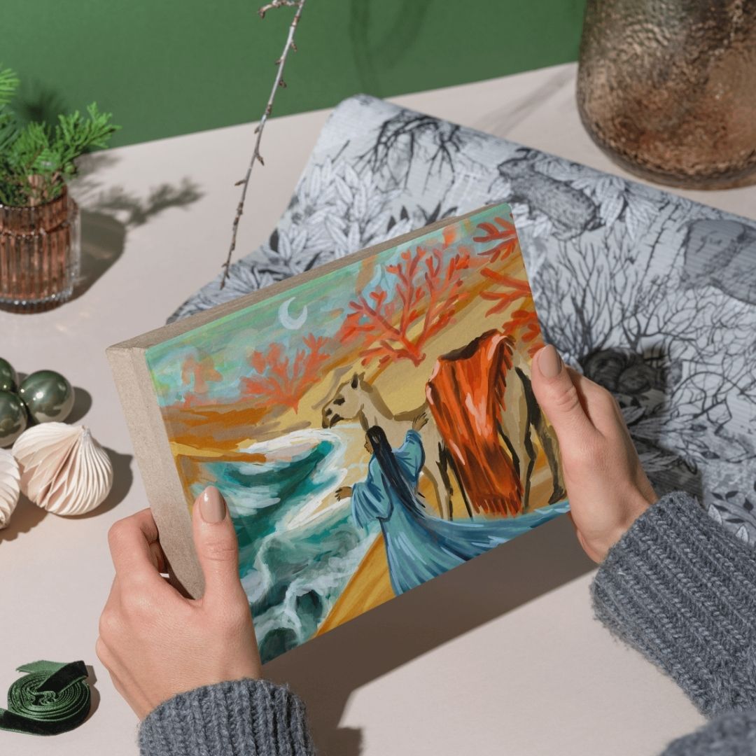 Great Exodus of The Reef artwork as a canvas print held in two hands